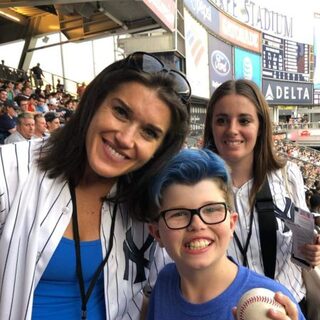 Dalton with Usher advocate Rebecca Alexander at a Yankees game